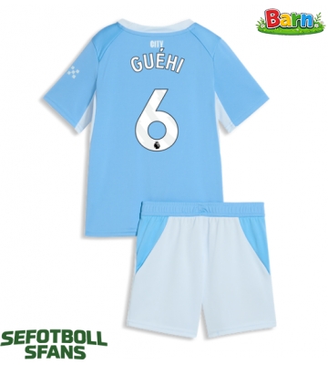 Manchester City Marc Guehi #6 Hemmaställ Barn 2026-27 Kortärmad (+ Korta byxor)